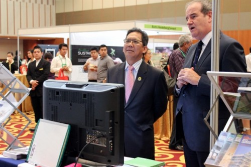 Explaining our booth to the Minister of Development, Pehin Dato Haji Suyoi
