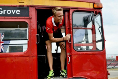 Formula one driver Max Chilton of British Marussia F1 Team exits the driver’s cab of the British Embassy’s London Bus
