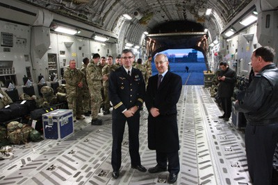 Sir Peter Ricketts and Colonel Severin inside the RAF C-17 plane, at Evreux airbase, 13 January 2013.