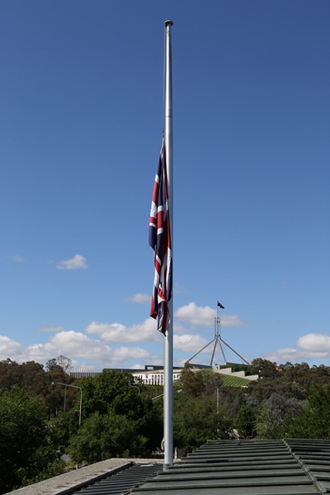 The Union Flag flies at half-mast over the British High Commission in Canberra.