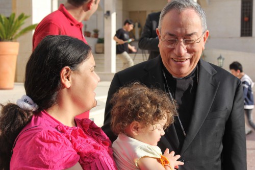 Cardinal Rodriguez with Syrian refugee