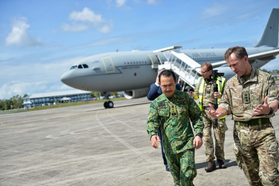 British Defence Advisor Colonel Mike Page speaking to RBAF Commander Pehin Dato Paduka Seri Mohd Tawih after going aboard the Voyager aircraft