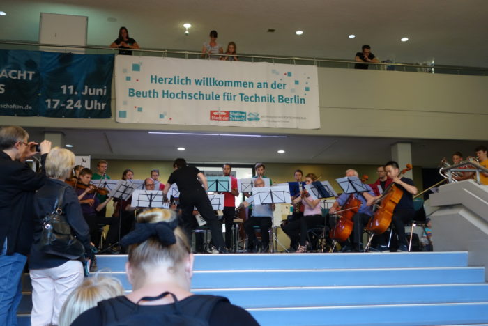 A musical interlude amid all the science stands in the foyer of the Beuth University of Applied Sciences.