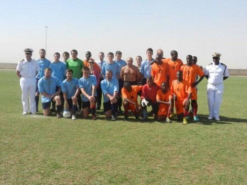 Commander Tim Neild, HE Mrs Marianne Young, Commander Ndiyaamena and the two navy teams enjoy a game of football