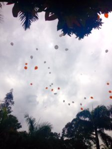 Balloons launched by friends and relatives of Mia Ayliffe-Chung at her memorial on Australia's Gold Coast