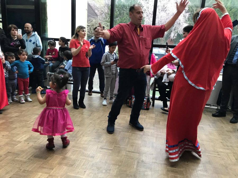 A family dancing as they celebrate Nowruz in a temporary accommodation facilities for migrant families in Bihac