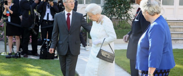 Sir Peter Ricketts and Her Majesty the Queen at the British Ambassador's Residence