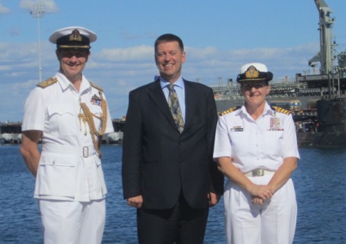 HE Paul Madden, DA Commodore Richard Powell RN, Captain Angela Bond RN in front of HMS Tireless