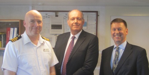 Commander Philip Newell RN, Senator David Johnston, HE Paul Madden on board HMS Echo