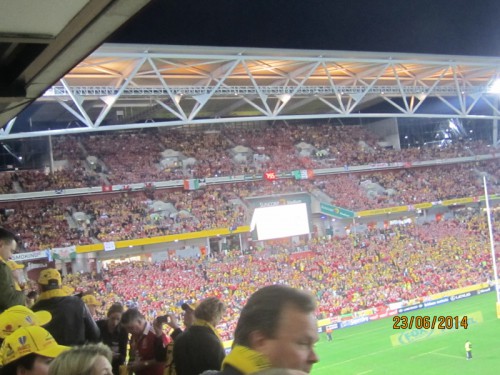 Fans in red and gold at Suncorp stadium