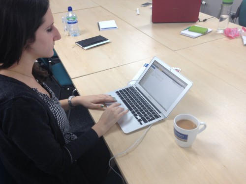 Rachel of the Association of Commonwealth Universities tests the new Chevening administrator’s system, while drinking tea from a Chevening mug