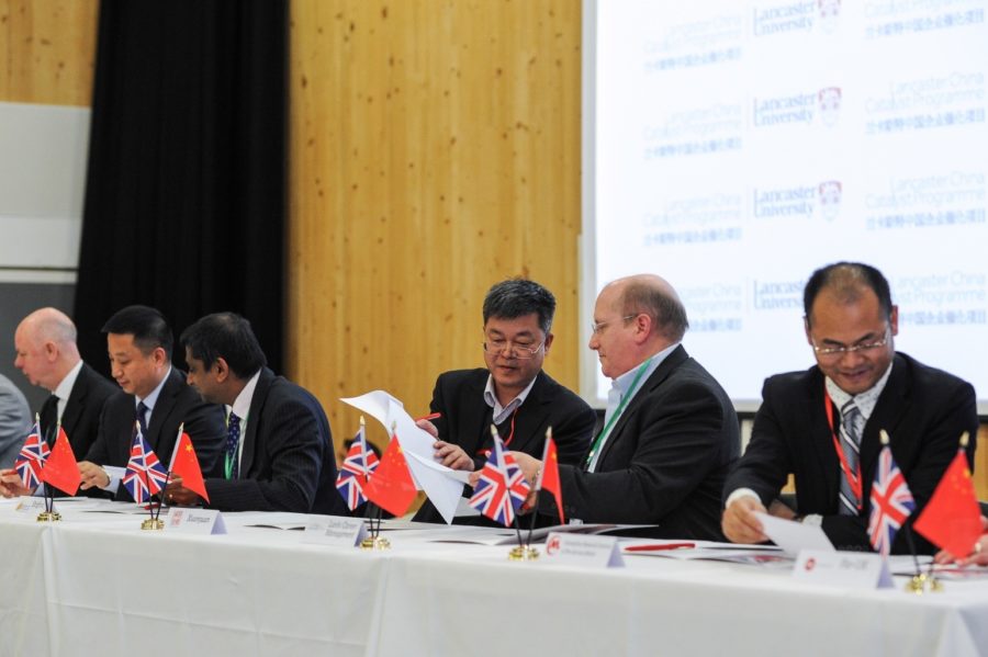 UK and Chinese companies signing co-operation agreements at a 'signing ceremony' in 2015