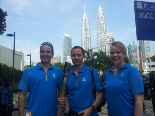 QBR Team with the Baton in front of the Petronas Towers